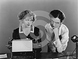 Two women with typewriter