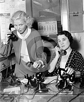 Two women working on a phone bank