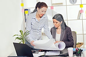 Two Women Working Together In Design Studio.