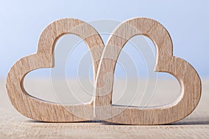 Two wood hearts simbol of love