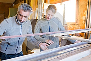 two wood workers in carpentry