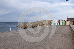 Two wooden cottages, close the sea