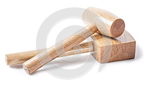 Two wooden mallets woodworkers tools isolated on white bavkground photo