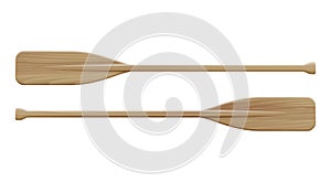 Two wooden paddles. Sport oars. photo