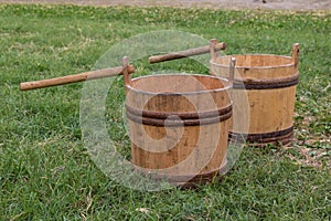 Two Wooden Pails on Meadow