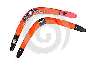 Two wooden painted colorful boomerang over white