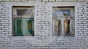 Two Wooden windows on old brick house in Vojvodina Serbia