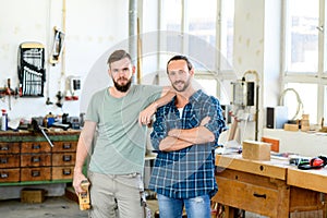 Two worker in a carpenters workshop