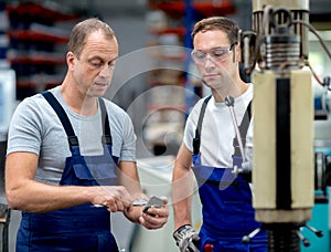 Two worker in factory