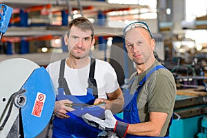 Two worker in factory