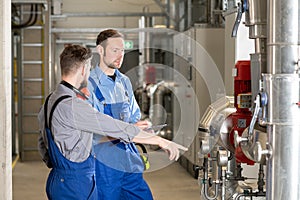 Two worker in industrial plant