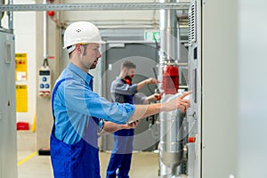 Two worker in industrial plant