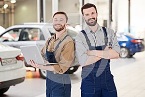 Two Workers in Car Service