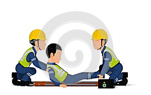 Two workers is laying the patient on the stretcher