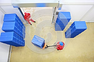 Two workers preparing goods delivery