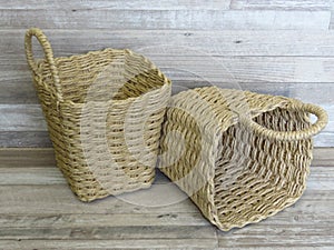 Two woven baskets made of straw, rattan, cane. Beautiful Handmade Woven Bamboo / Cane Basket.