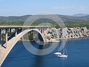 Two yachts and the bridge