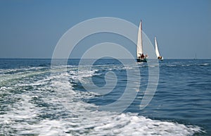 Two yachts on sea open space