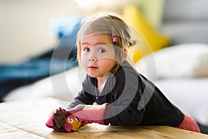 Two year old girl with big eyas portrait, Indoor shoot with natural light