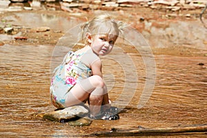 A Two Year Old Pixie at the Creek