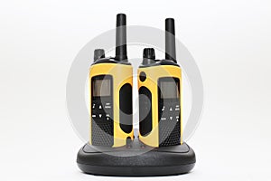 Two yellow and black portable radio set