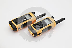 Two yellow and black portable radio set