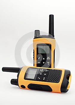 Two yellow and black portable radio set