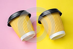 Two yellow coffee cups