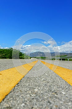 Two yellow dividing line on the highway