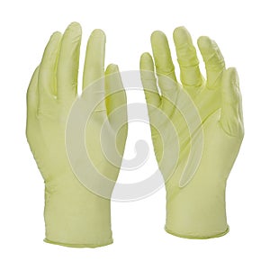 Two yellow latex medical gloves isolated on white background with no hands
