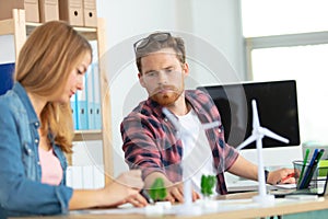 two young architects in office