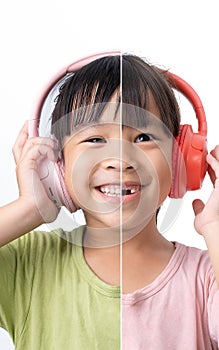 Two young Asian girls half faces brought together smiling happily listening to music on wireless headphones isolated on white