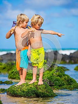 Two young boys having fun on tropcial beach