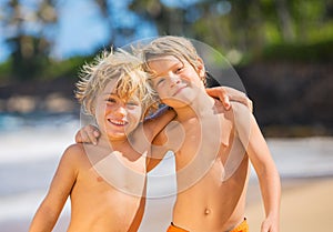 Two young boys having fun on tropcial beach