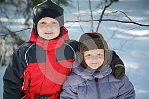 Two Young Boys Playing in Snow