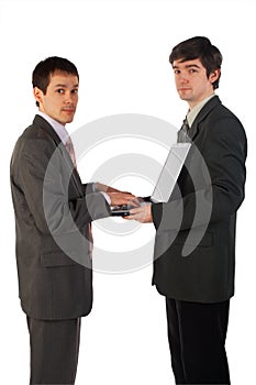 Two young businessmen working 1
