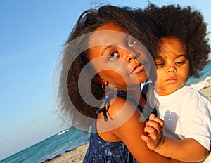 Two Young Children Hugging