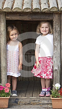 Two Young Children Playing Together at Montessori/