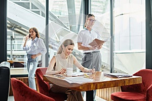 two young colleagues in smart wear