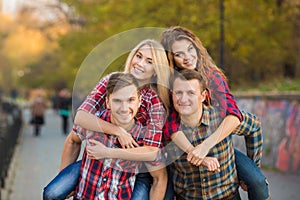 Two young couples spend time in the Park