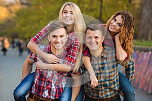 Two young couples spend time in the Park