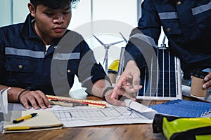 Two Young Engineers Expertise in Solar Cell Installation Meetings and Discussion in The Job. Planning to Install Solar