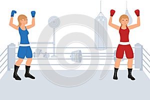 Two young female boxers fight in the ring