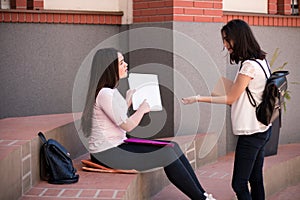 Two young female students preparing for exams