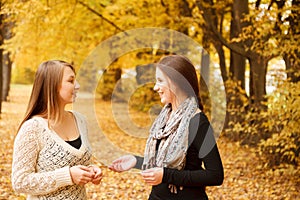 Two young females outdoors