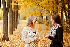 Two young females outdoors