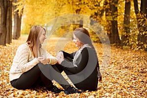 Two young females outdoors