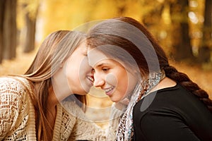 Two young females outdoors