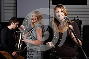 Two young females sign the song photo