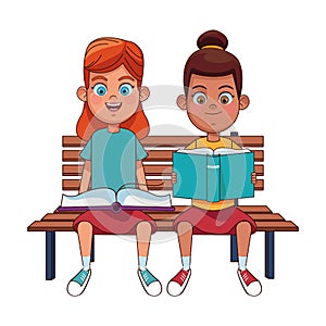 Two young girls reading books
